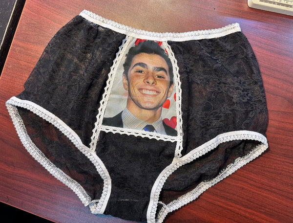 largish Luigi Mangione black lace